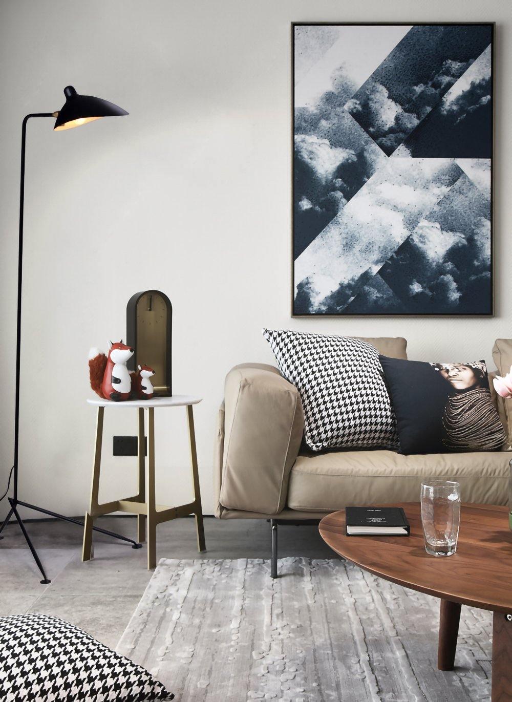 Floor lamp arm joint and counterweight detail in matte black