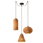 This single-canopy Clérachic cluster staggers a cylinder, a pumpkin-round, and a cone rattan shade at different depths.