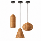 Three rattan Clérachic pendants in cylinder, cone, and pumpkin shapes hang at different heights from separate canopies.