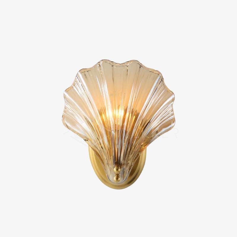 On a bright white backdrop, the fan-shaped amber glass shell of this Clérachic wall light glows softly.