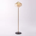 A small full-length product view of this Clérachic floor lamp against a plain grey backdrop.