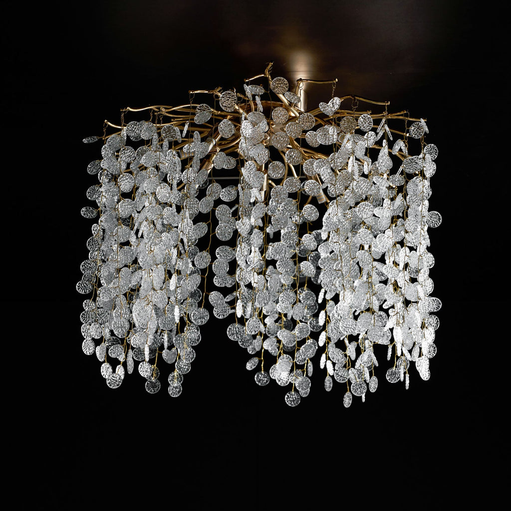 Against a dark background, this Clérachic ceiling light in silver shows its clear glass discs and branches up close.