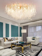In a living room with teal striped walls and sheer curtains, this Clérachic ceiling light glows above two white tufted sofas on a zebra-print rug.