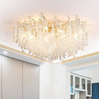 This Clérachic ceiling light sits flush against crown moulding beside sliding closet doors, its frosted glass discs unlit.