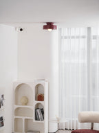 Stacked cylinder ceiling light variants viewed side by side