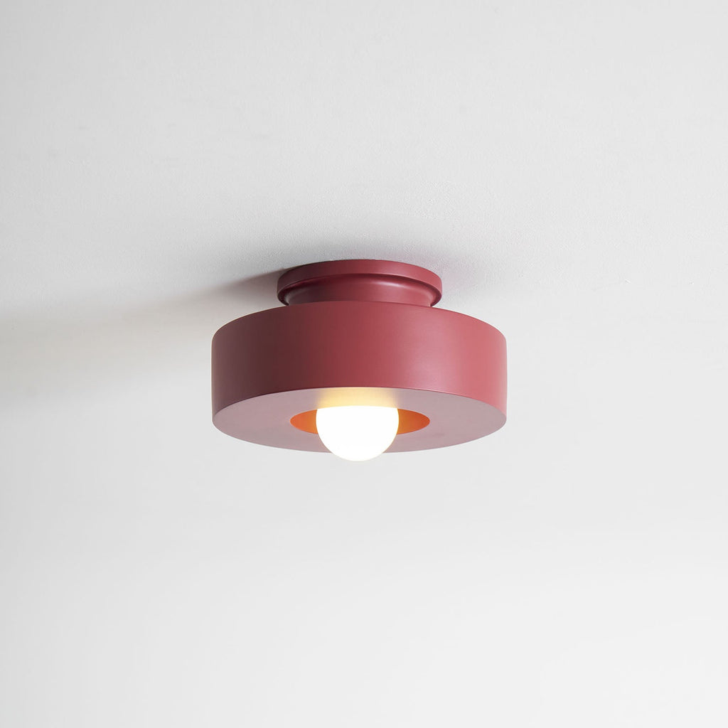 Stacked resin cylinder ceiling light mounted in a modern room