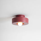 Stacked resin cylinder ceiling light mounted in a modern room