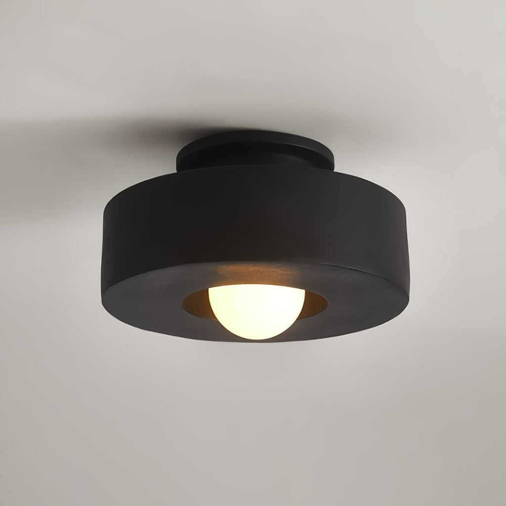 Stacked cylinder ceiling light shown lit from below