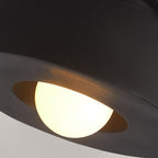 Sculptural stacked ceiling light shown from a low angle