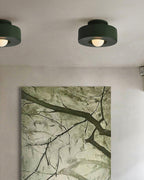 Sculptural resin ceiling light with bold geometric proportions
