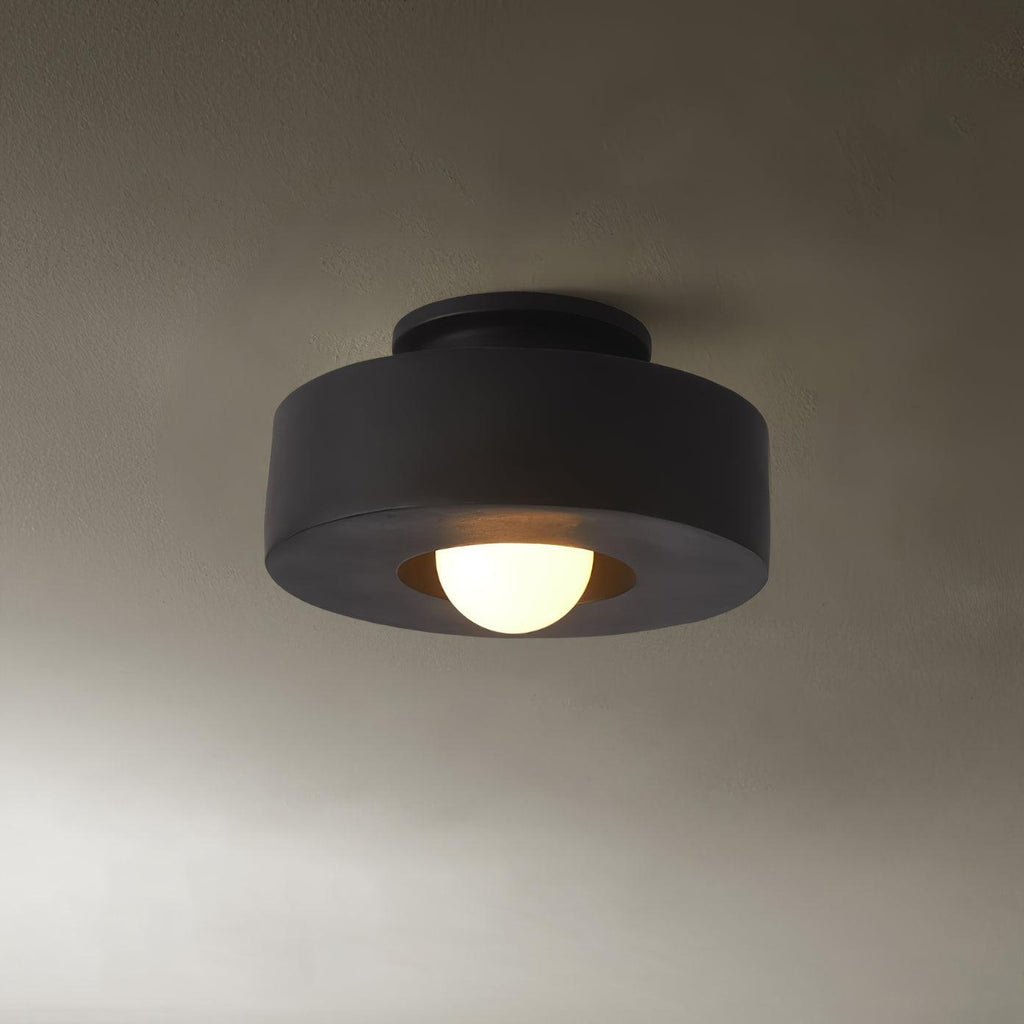 Resin ceiling light showing chunky stacked geometric form