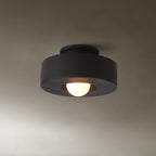 Resin ceiling light showing chunky stacked geometric form