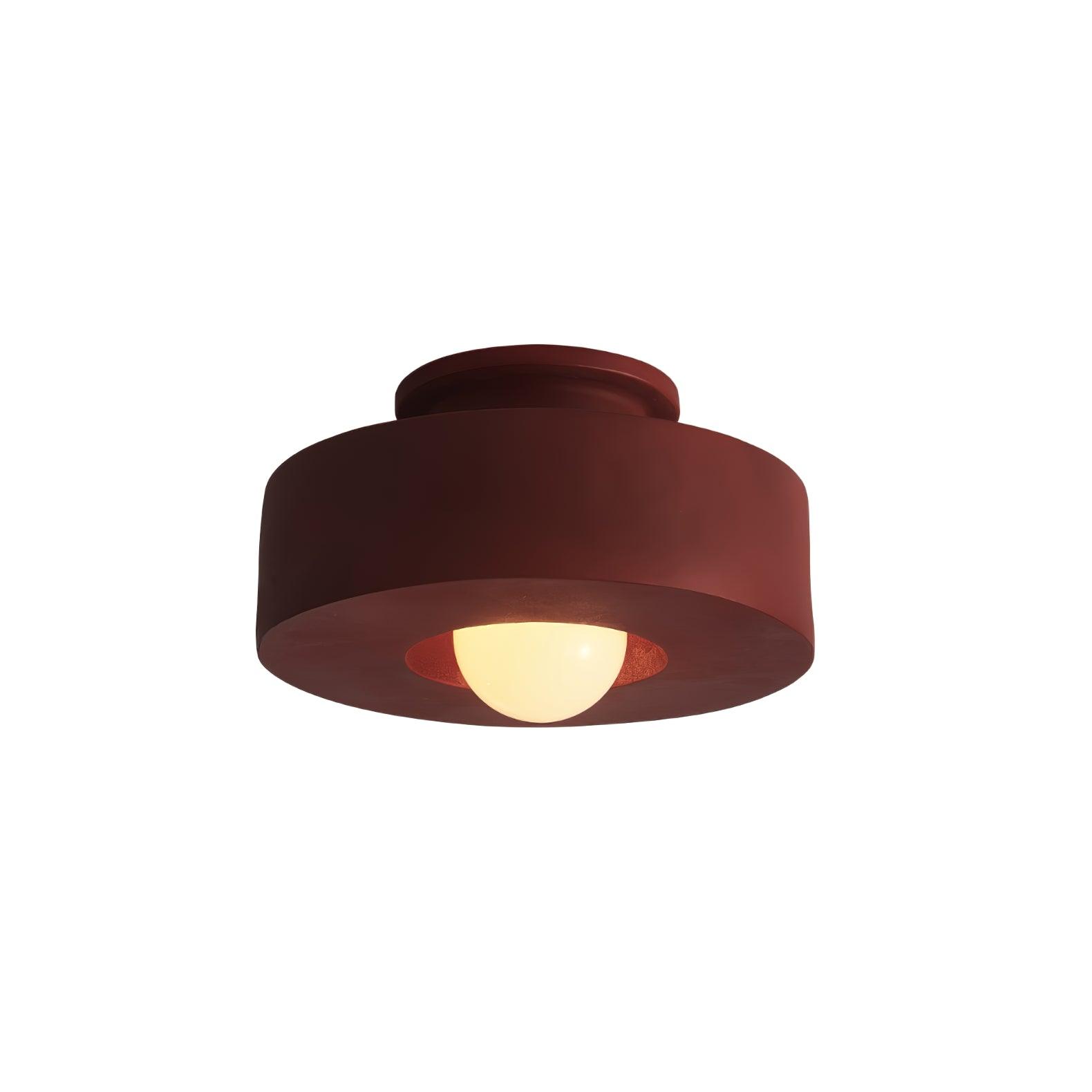 Sculptural ceiling light with chunky resin cylinders overhead