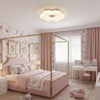 Pink flower ceiling light adding soft colour to a nursery