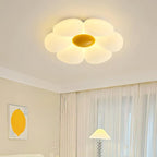 Six-petal ceiling light shown lit against a pale ceiling