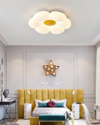 Flower ceiling light glowing softly in an evening room