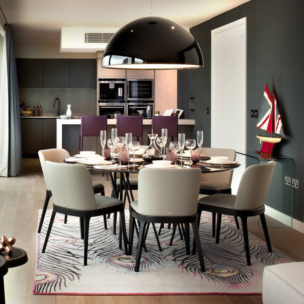 Cast plaster pendant light shown at a grand dining scale