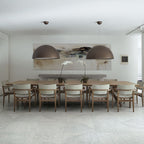 Cast plaster pendant casting even ambient light from above