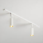 White track light with slim cylinder heads along a rail