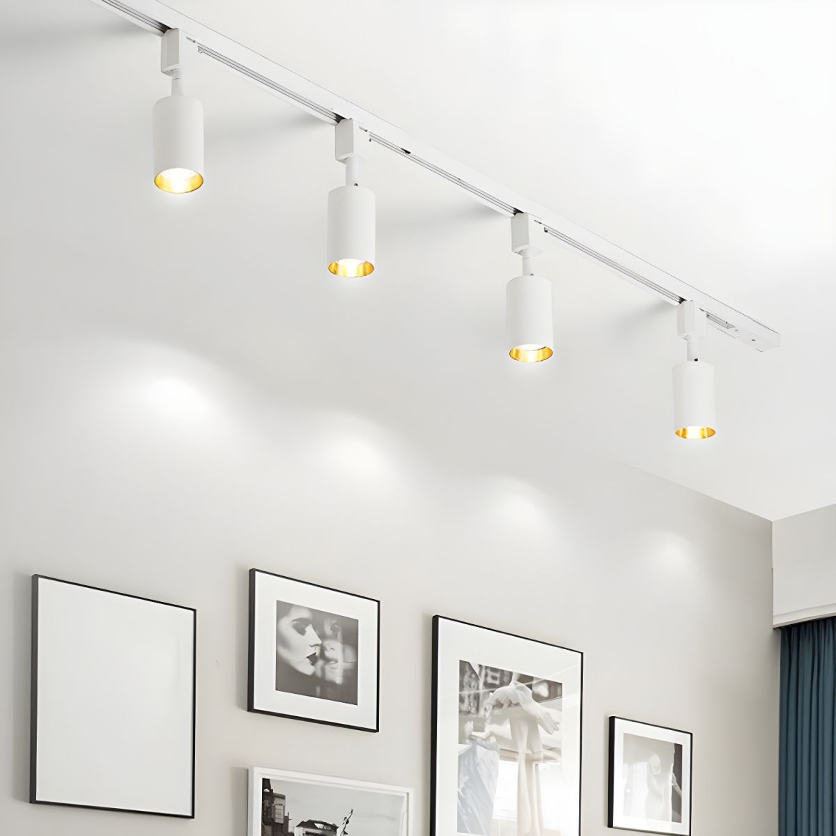 Cylinder track light spotlights lighting a modern hallway
