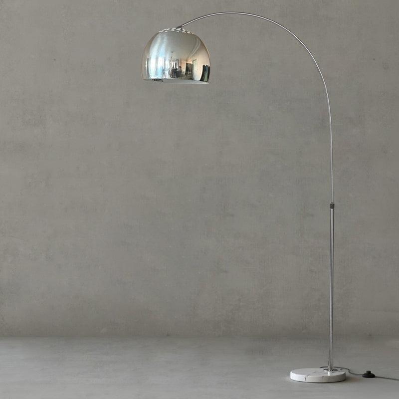 Clérachic arc floor lamp with a mirrored chrome dome shade shown full-length against a plain grey studio background.