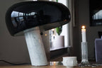Carrara marble table lamp with a warm glazed glow