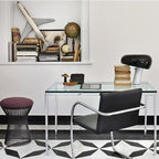 Marble base lamp with a glazed metal reflector, lit warm