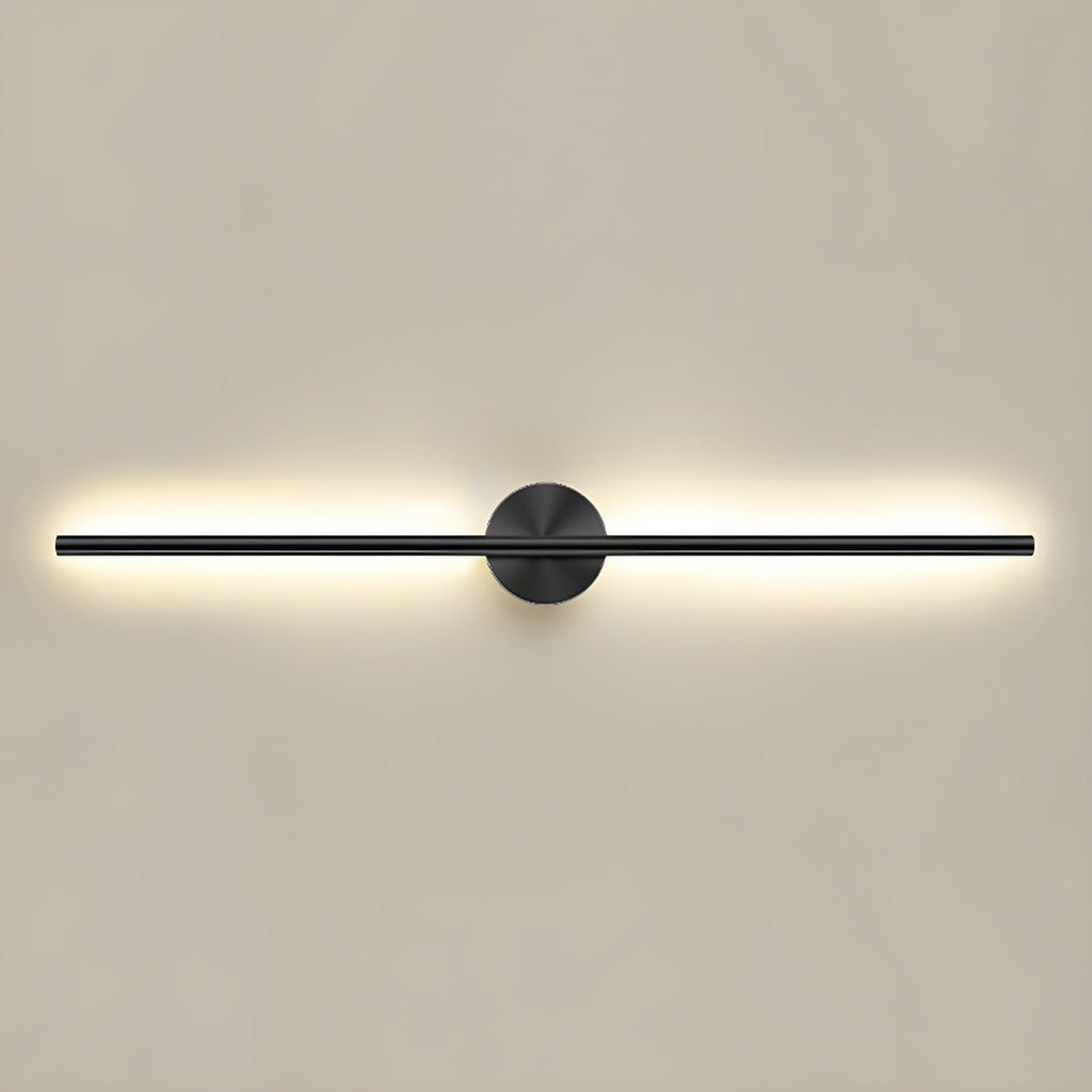 Gold linear sconce mounted above a console in a hallway