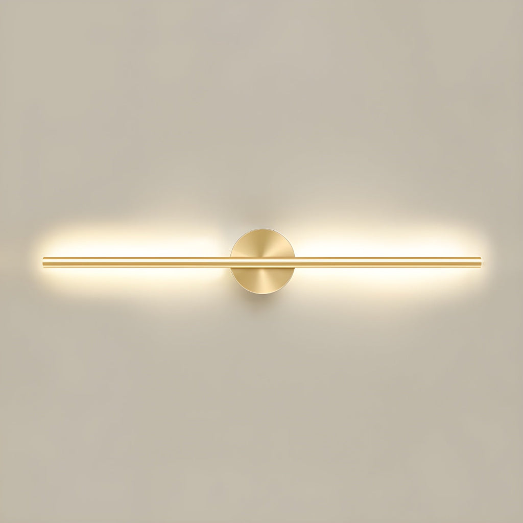 Slim metal linear wall sconce glowing in a contemporary lounge