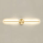 Linear wall sconce with warm LED light beside a living room sofa