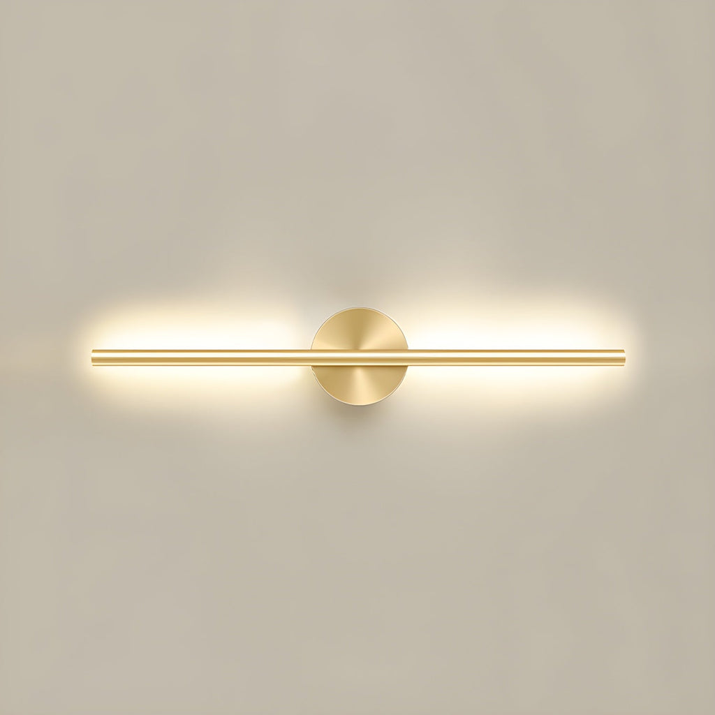 Linear LED wall sconce mounted on a wall casting soft warm light