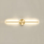 Linear LED wall sconce mounted on a wall casting soft warm light