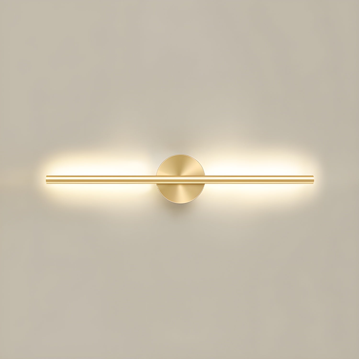 Linear LED wall sconce mounted on a wall casting soft warm light