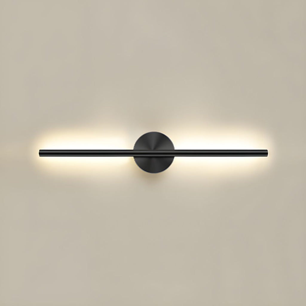 Black linear LED wall sconce illuminating a modern interior wall