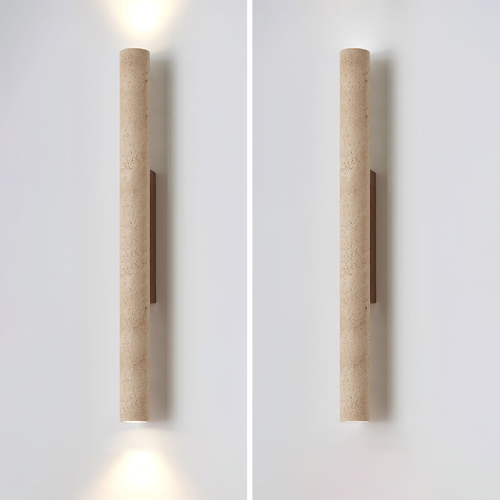 Two studio views of this Clérachic wall light sit side by side against a plain wall.