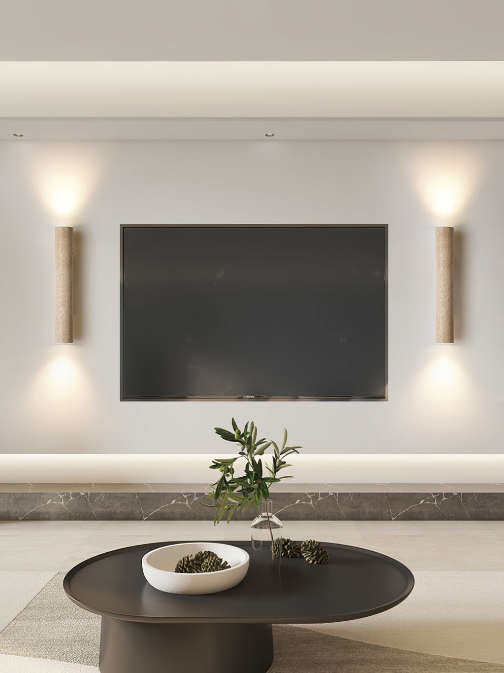 Two of this Clérachic wall light flank a wall-mounted television above a round coffee table.