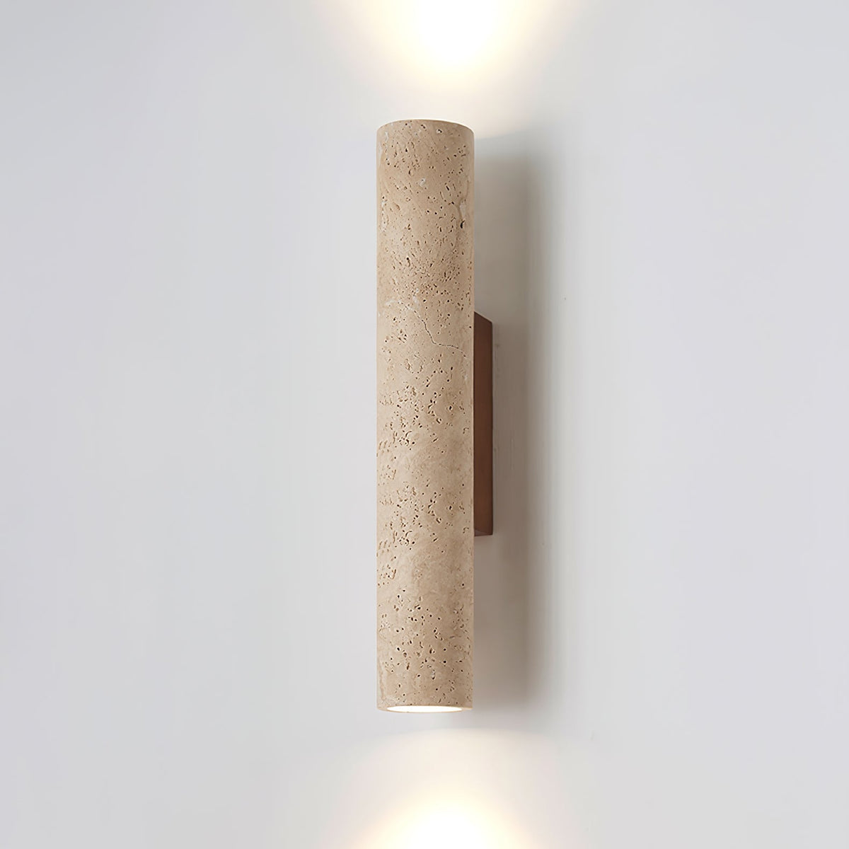Angled studio shot of this Clérachic wall light, lit, walnut wood mount showing at the side.