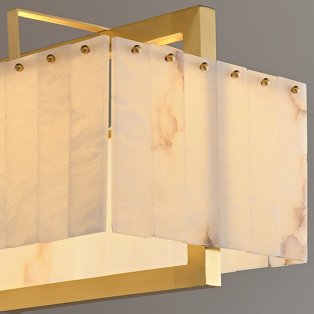 Close-up of the alabaster panels and the brass studs that hold them in the frame.