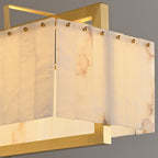 Close-up of the alabaster panels and the brass studs that hold them in the frame.
