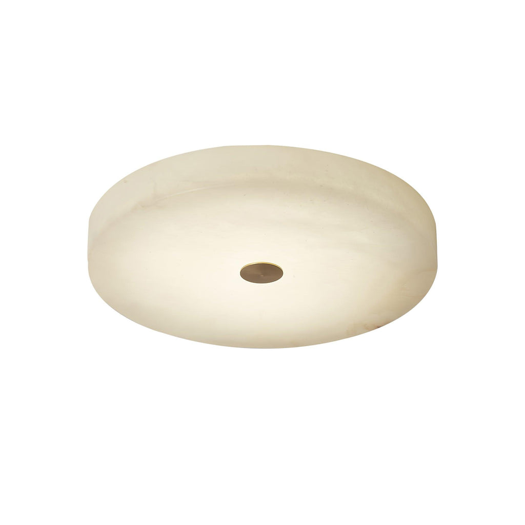 Product view of the unlit Olaean flush mount on white, showing the cream alabaster drum and brass cap.