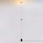 Tall floor lamp with conical metal shades and black marble base