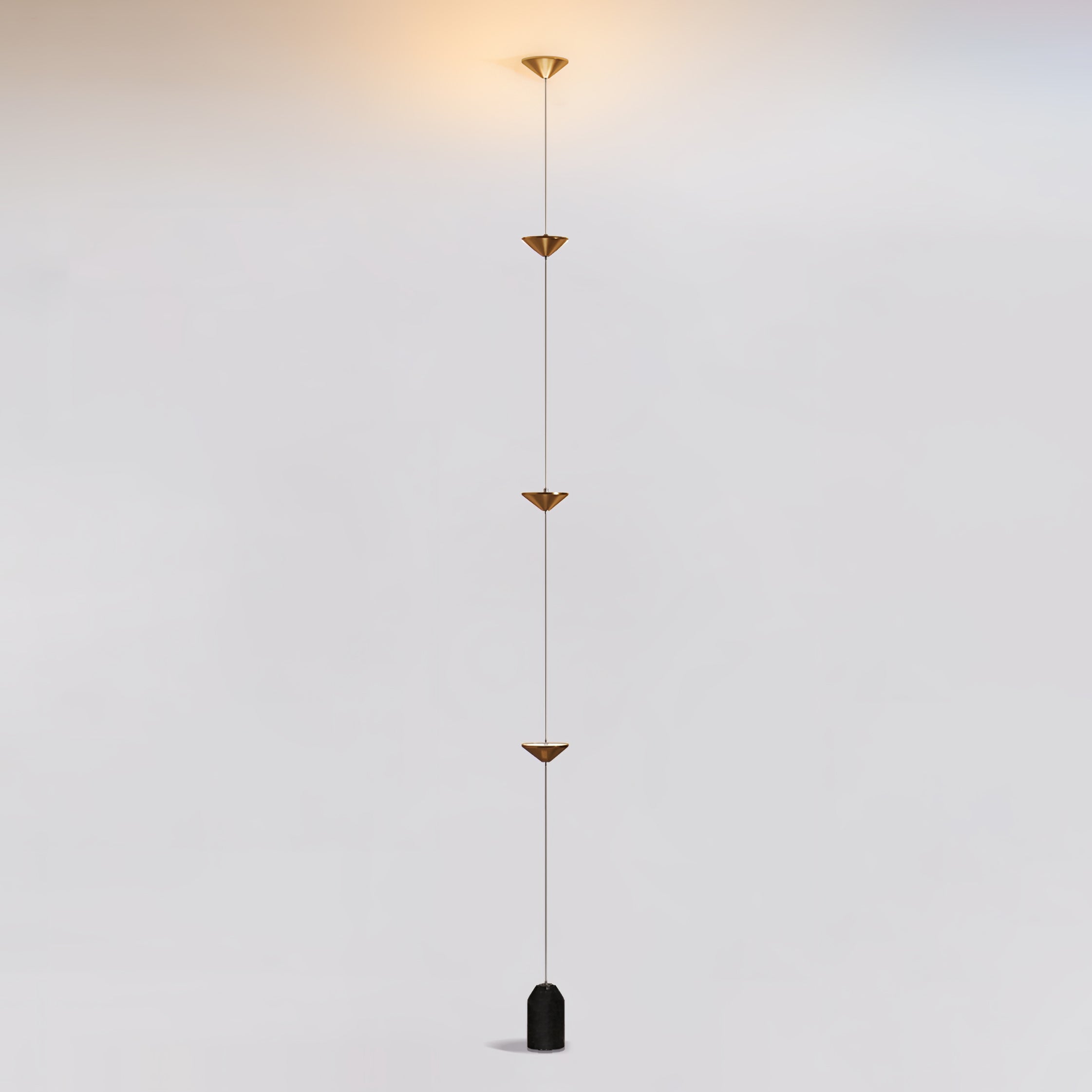 Floor lamp lighting a corner of a contemporary interior