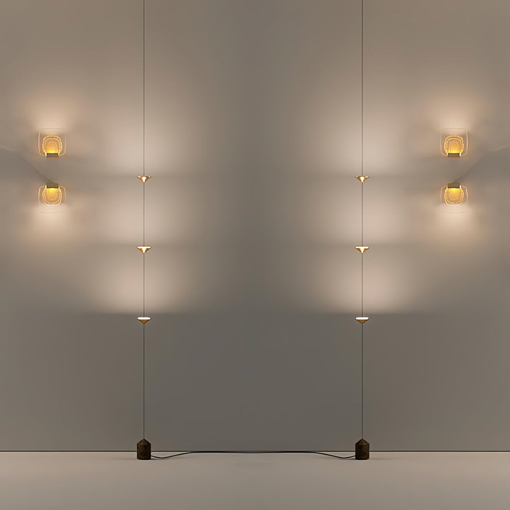 Floor lamp with stacked conical shades on a marble base
