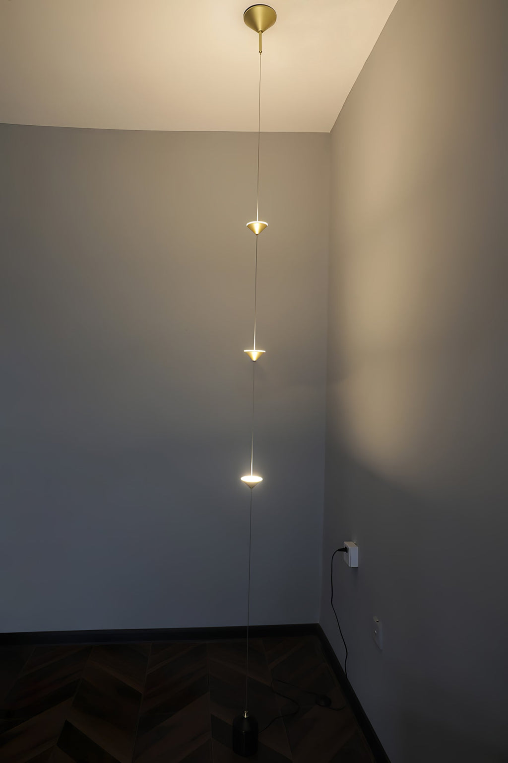 Floor lamp casting layered warm light in an evening interior