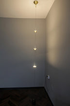 Floor lamp casting layered warm light in an evening interior