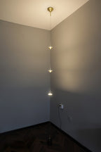 Floor lamp standing tall in a styled contemporary room