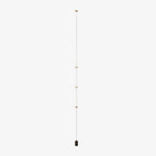 Floor lamp standing in a bright minimalist room