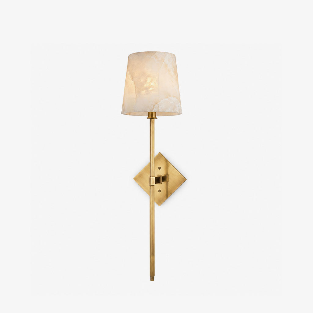 Unlit on a plain white background, this Clérachic sconce's straight brass rod passes through a diamond-shaped backplate.