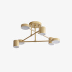 Sputnik ceiling light glowing softly in a styled dining area