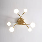 Sputnik ceiling light shown with arms extended in all directions